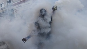 REUTERS/Murad Sezer A protester in Turkey braves tear gas.